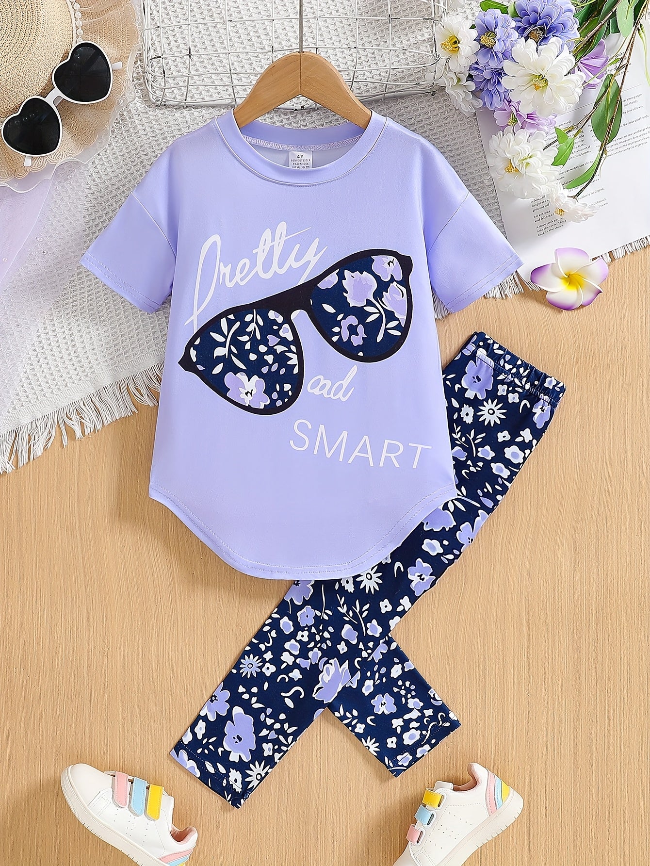 Ensemble de 2 pièces pour filles avec impression de grandes lunettes et motif de citation, t-shirt loose à épaules dénudées avec design asymétrique + leggins courts à imprimé floral du 4 au 8 ans