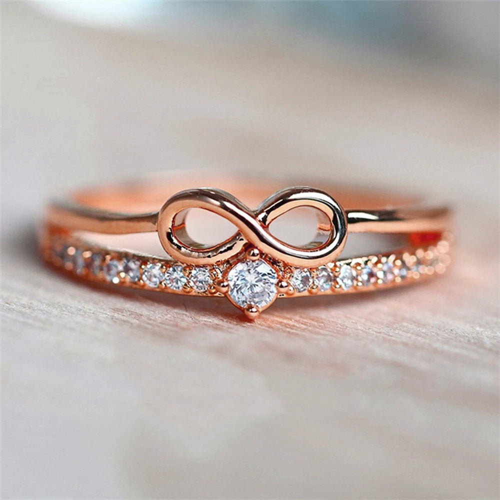 Huitan – bague Chic en forme d'arc pour femmes, signe infini, zircone cubique, accessoires de doigt à la mode, bijoux de fête quotidiens MAEJORKEN