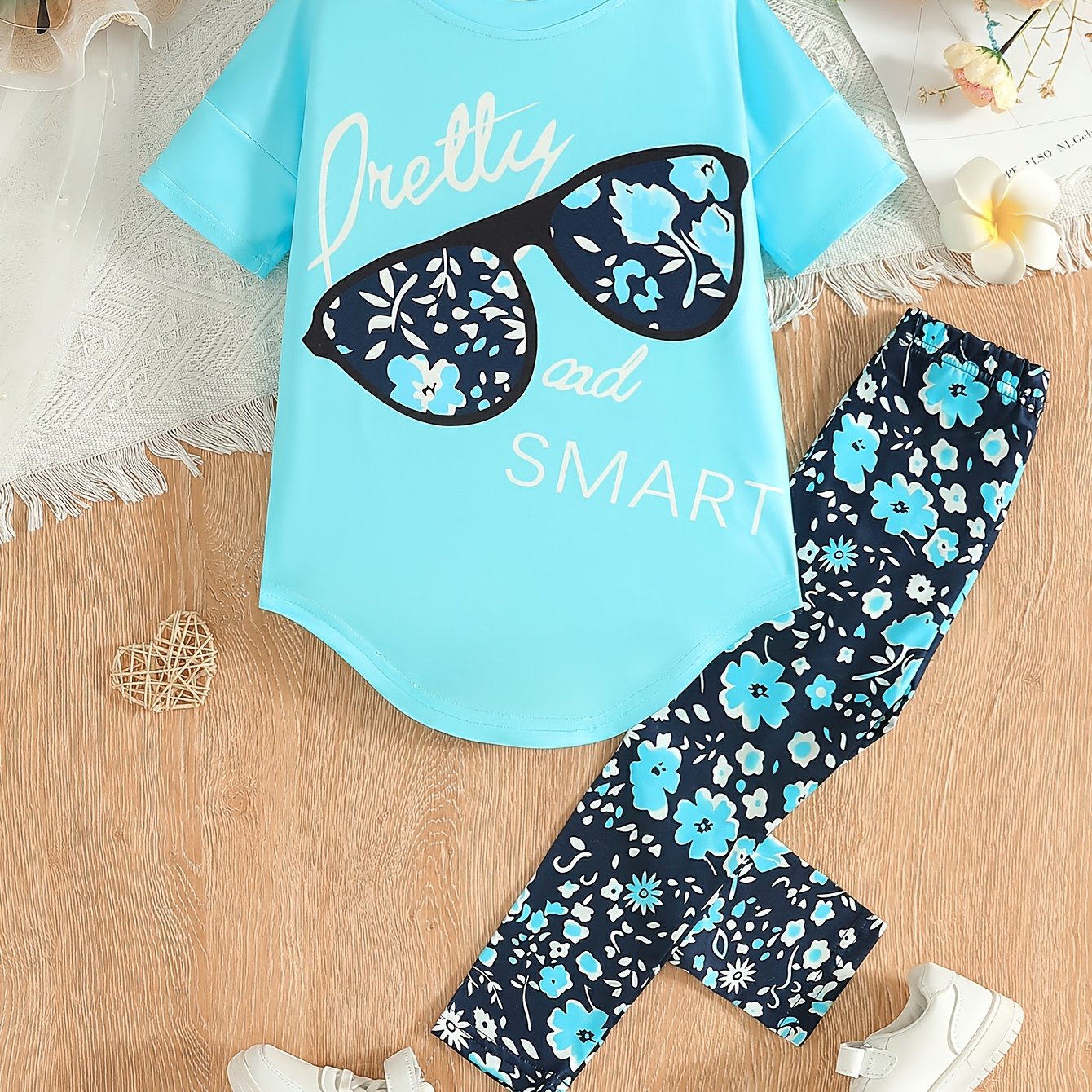 Ensemble de 2 pièces pour filles avec impression de grandes lunettes et motif de citation, t-shirt loose à épaules dénudées avec design asymétrique + leggins courts à imprimé floral du 4 au 8 ans