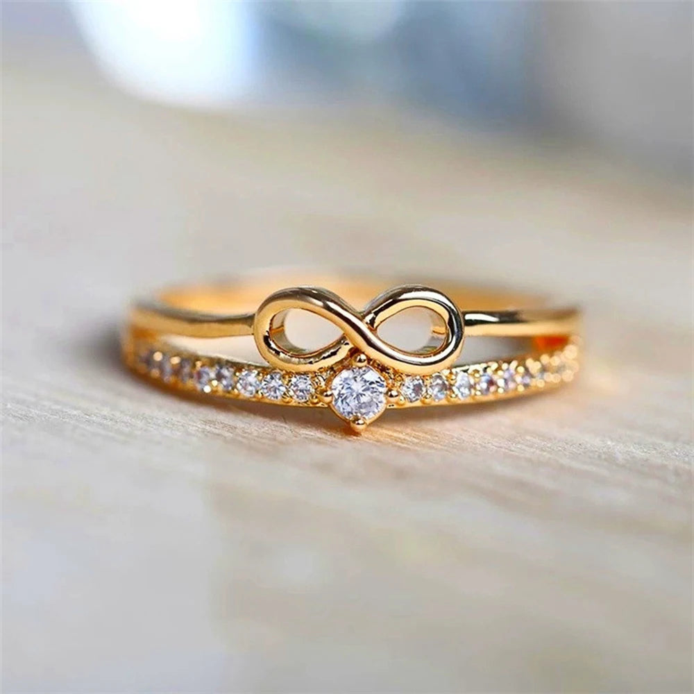 Huitan – bague Chic en forme d'arc pour femmes, signe infini, zircone cubique, accessoires de doigt à la mode, bijoux de fête quotidiens MAEJORKEN
