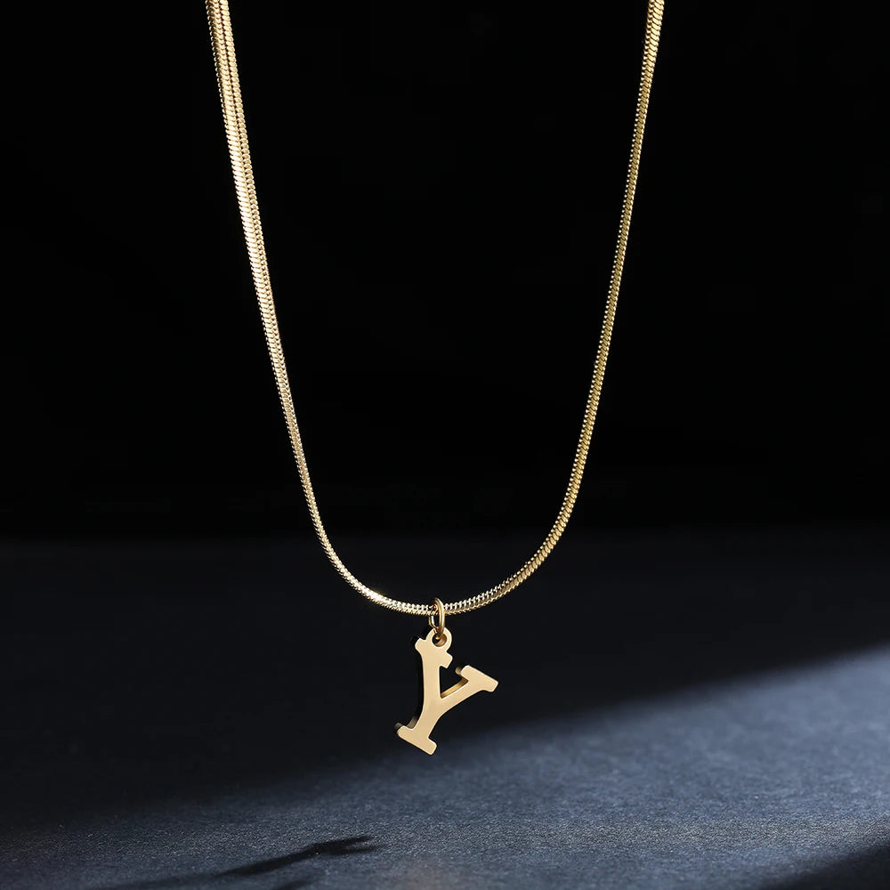 Pendentif  alphabet plaqué or inoxydable