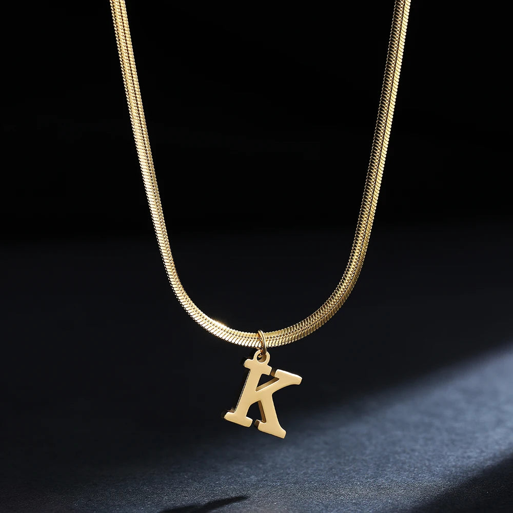 Pendentif  alphabet plaqué or inoxydable