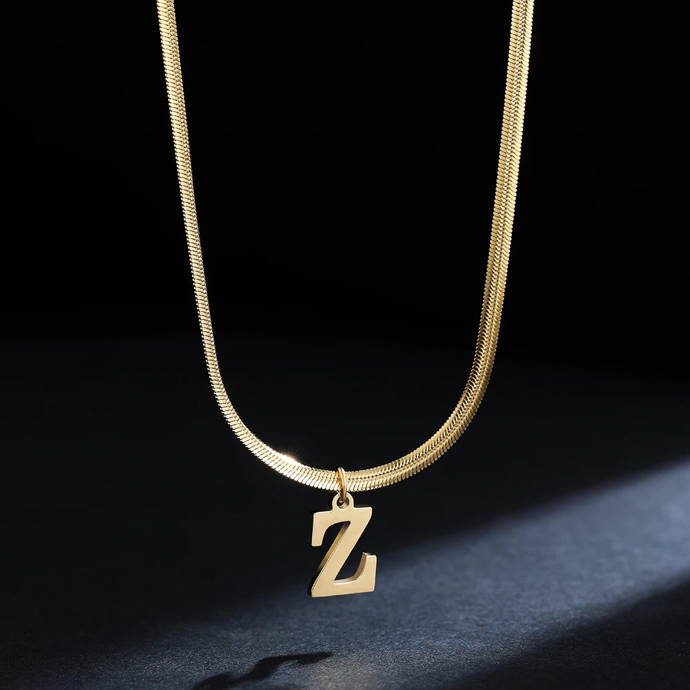 Pendentif  alphabet plaqué or inoxydable