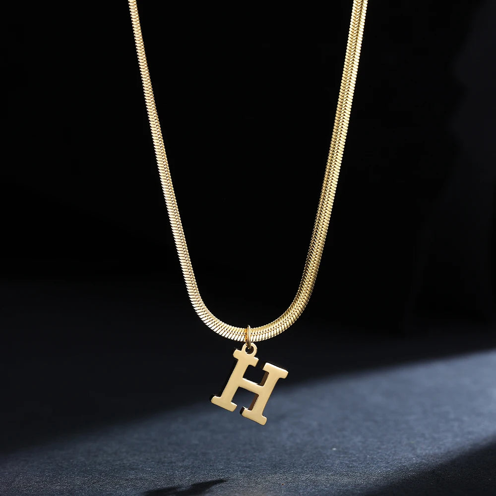 Pendentif  alphabet plaqué or inoxydable