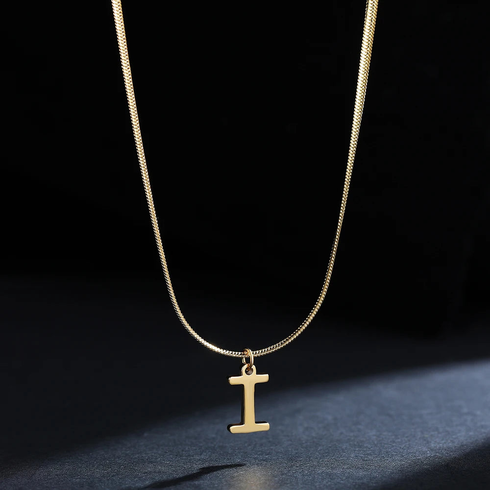 Pendentif  alphabet plaqué or inoxydable