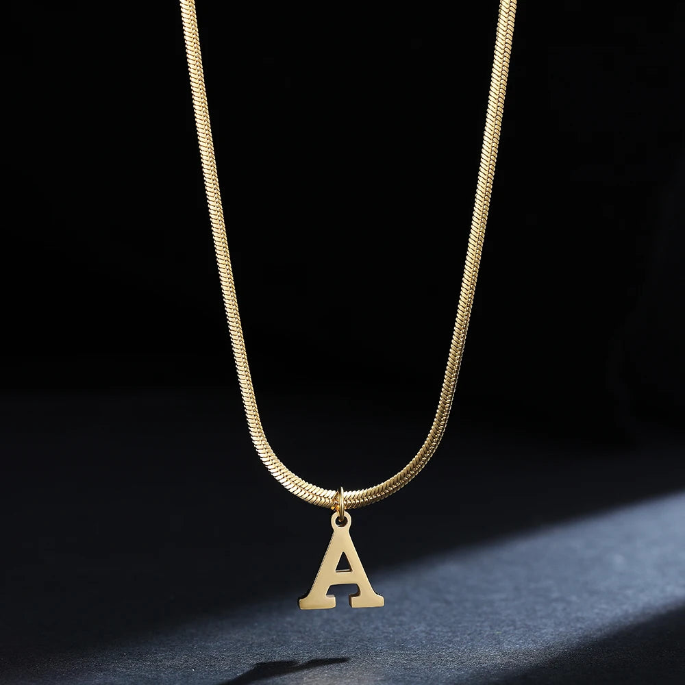Pendentif  alphabet plaqué or inoxydable