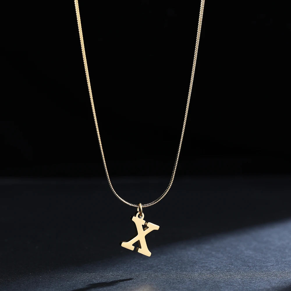 Pendentif  alphabet plaqué or inoxydable