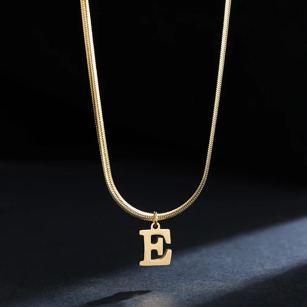 Pendentif  alphabet plaqué or inoxydable