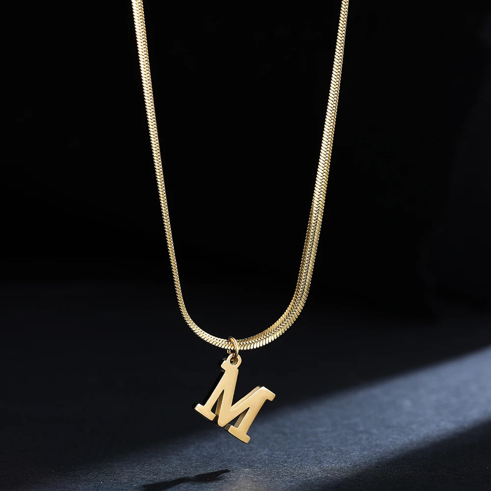 Pendentif  alphabet plaqué or inoxydable