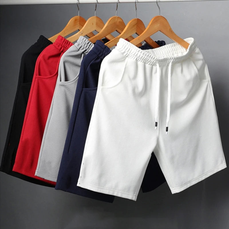 Nouveaux hommes d'été maille courte salle de sport musculation décontracté Shorts amples en plein air Fitness plage pantalons courts couleur unie mâle pantalon de survêtement MAEJORKEN
