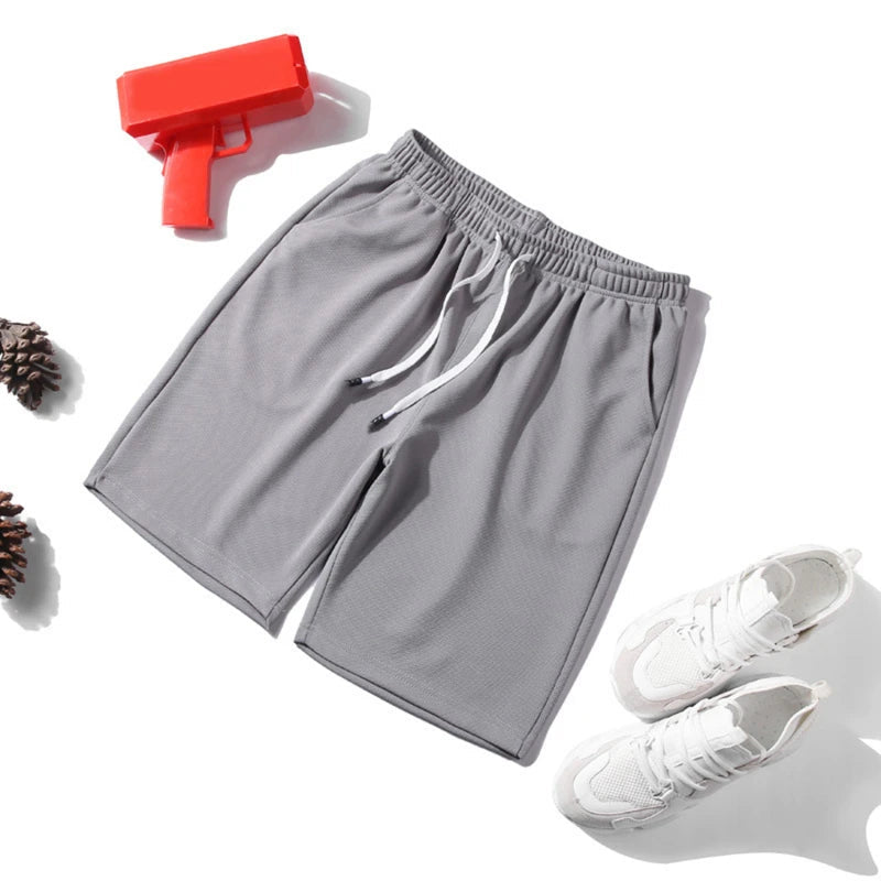 Nouveaux hommes d'été maille courte salle de sport musculation décontracté Shorts amples en plein air Fitness plage pantalons courts couleur unie mâle pantalon de survêtement MAEJORKEN
