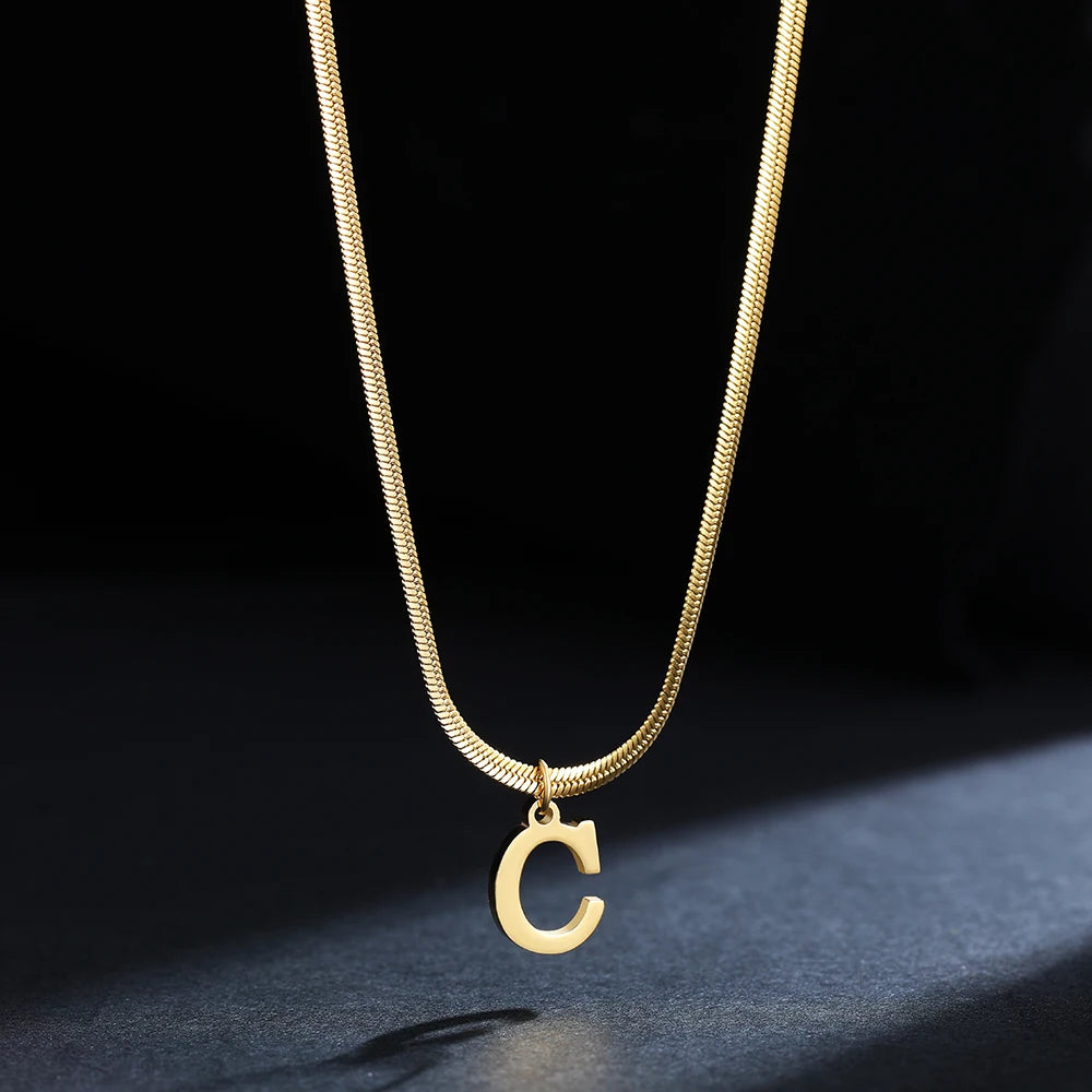 Pendentif  alphabet plaqué or inoxydable