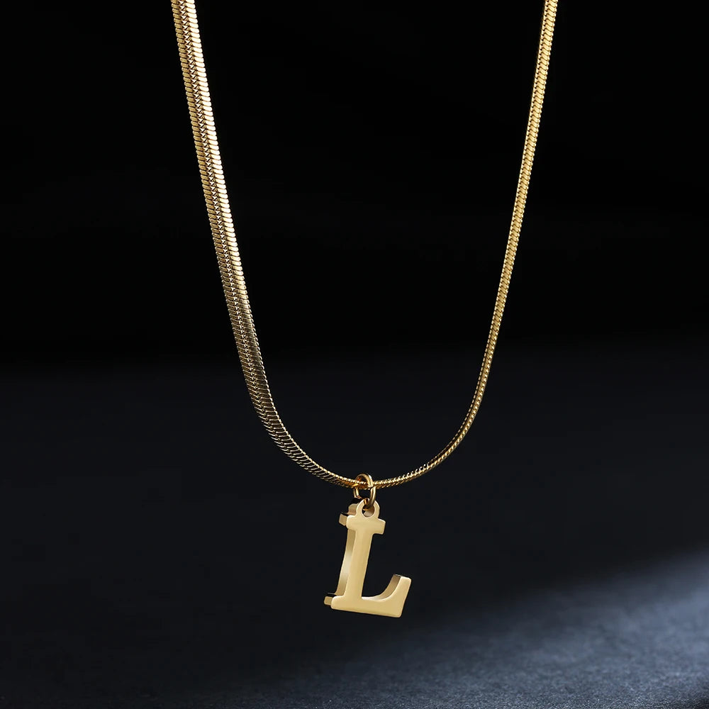 Pendentif  alphabet plaqué or inoxydable