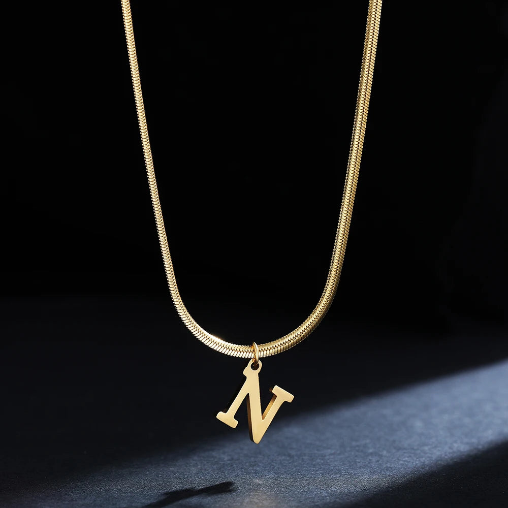 Pendentif  alphabet plaqué or inoxydable