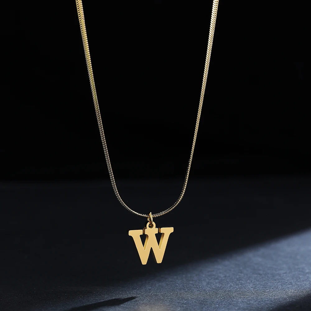 Pendentif  alphabet plaqué or inoxydable