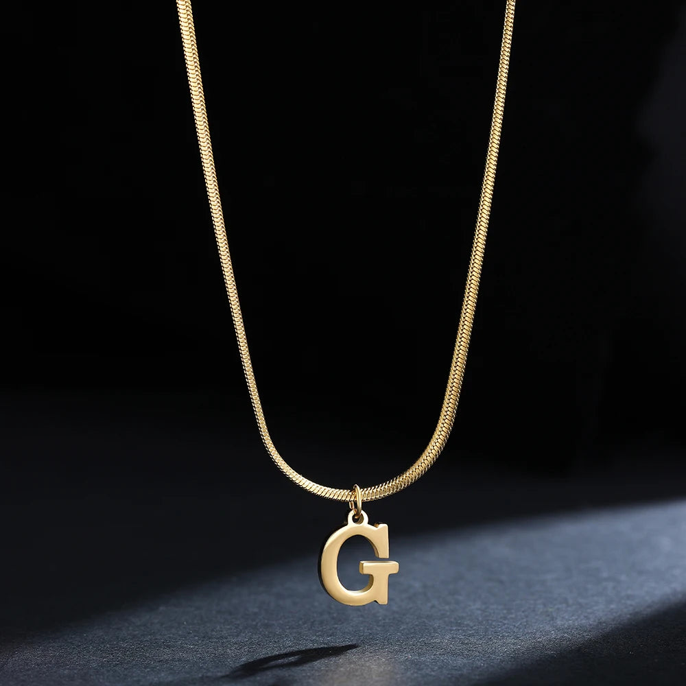 Pendentif  alphabet plaqué or inoxydable