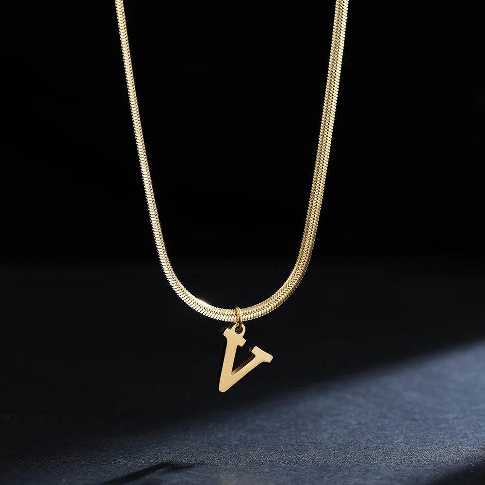 Pendentif  alphabet plaqué or inoxydable