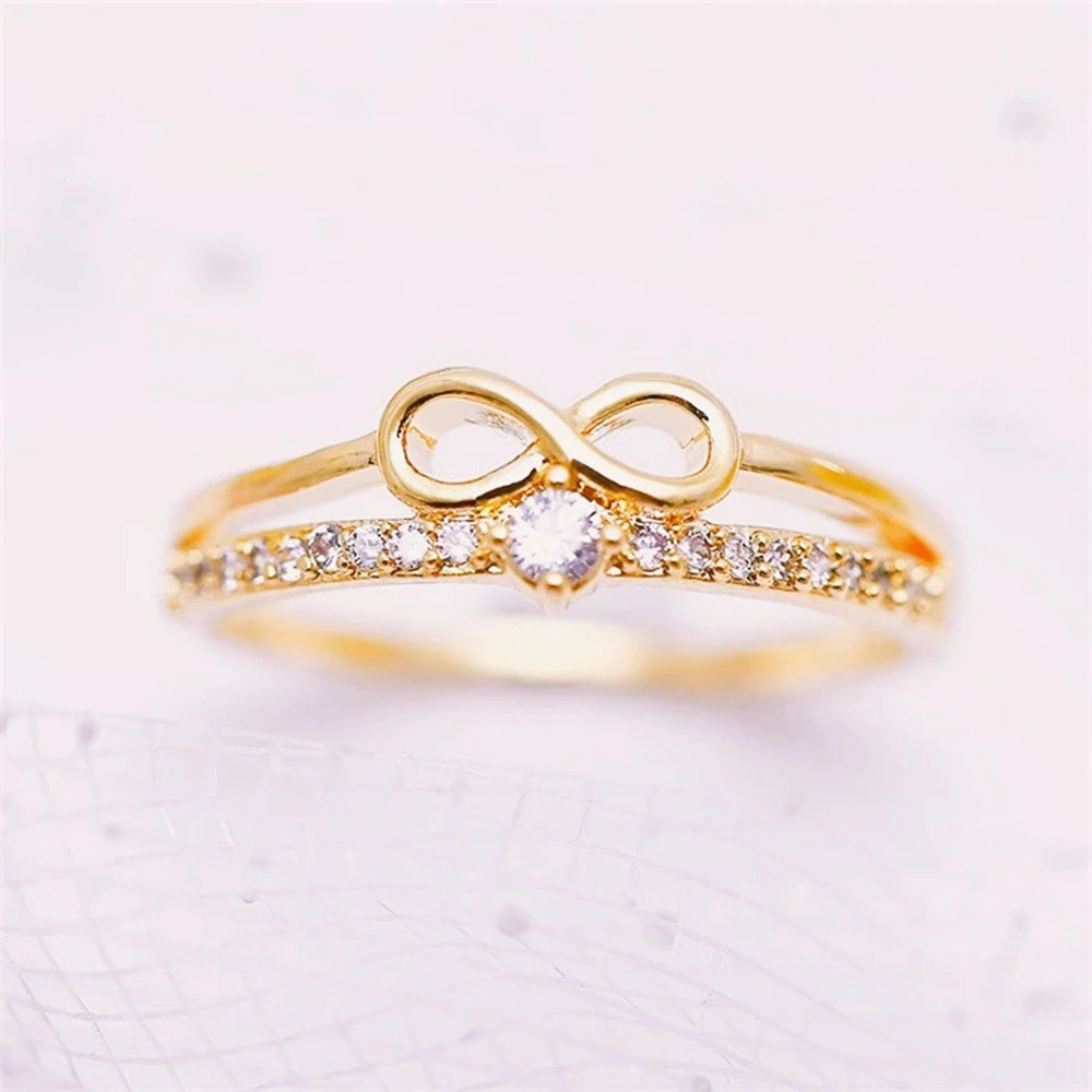 Huitan – bague Chic en forme d'arc pour femmes, signe infini, zircone cubique, accessoires de doigt à la mode, bijoux de fête quotidiens MAEJORKEN
