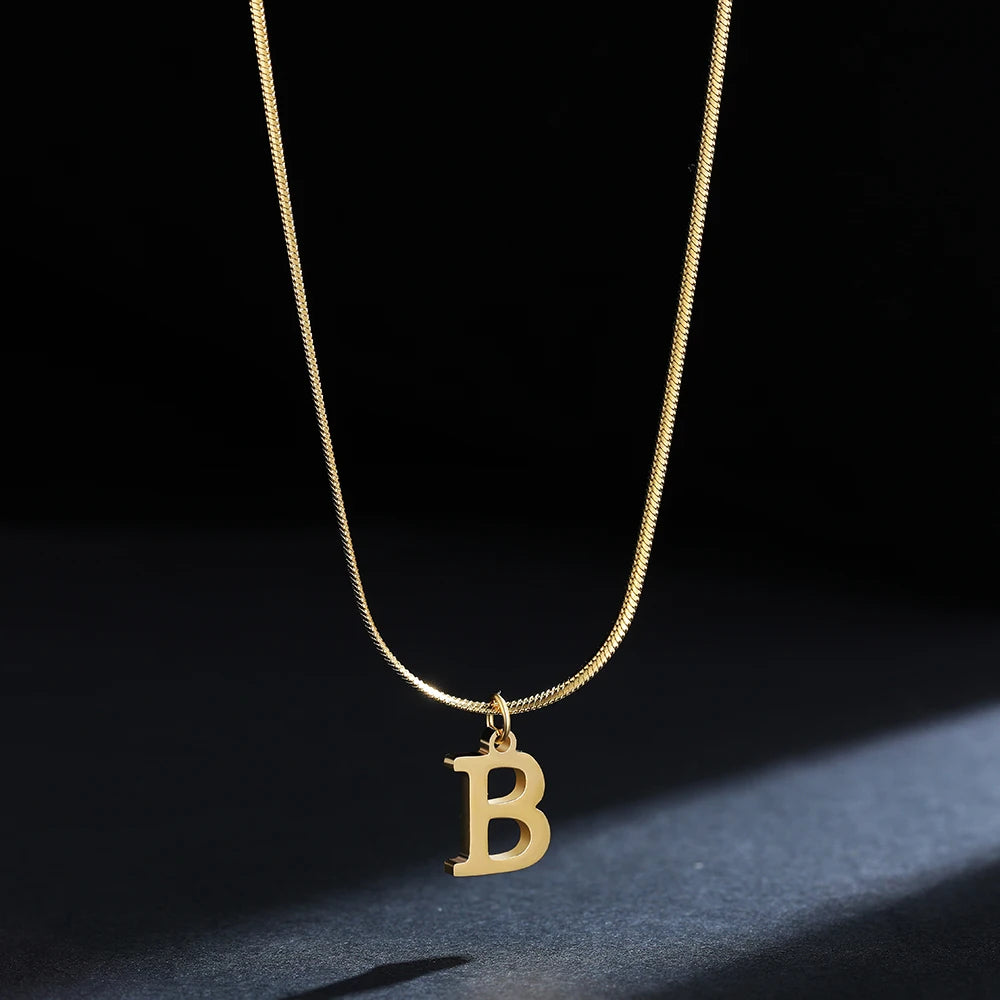 Pendentif  alphabet plaqué or inoxydable