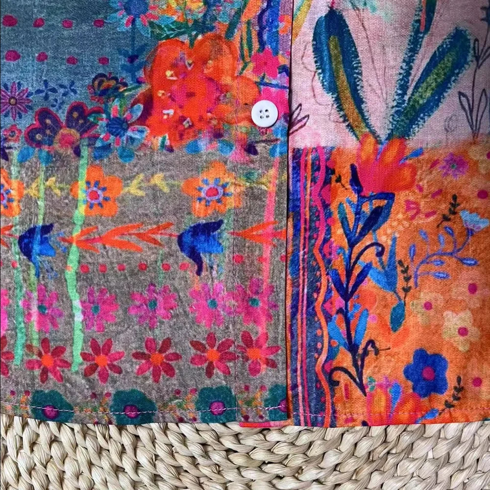 Cette chemise à manches longues de style bohème rétro avec motifs floraux colorés est tendance, polyvalente et accrocheuse. MAEJORKEN