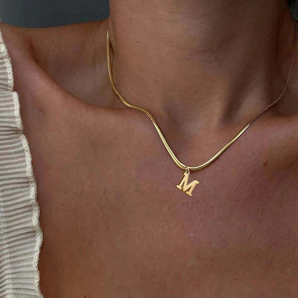 Pendentif  alphabet plaqué or inoxydable