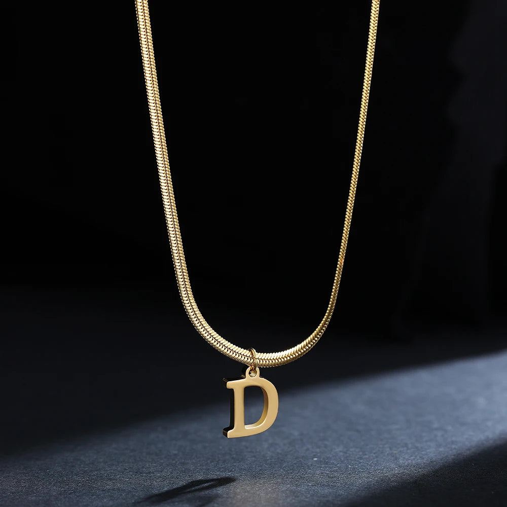 Pendentif  alphabet plaqué or inoxydable