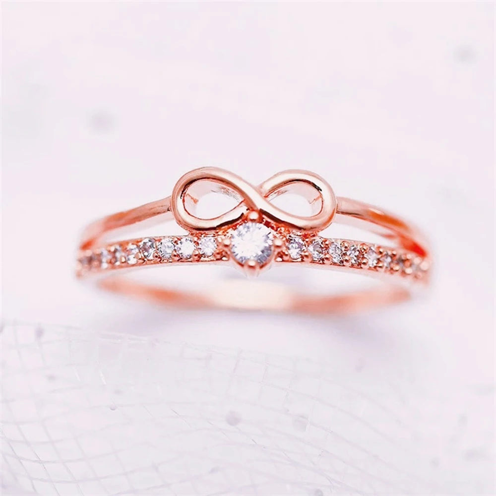 Huitan – bague Chic en forme d'arc pour femmes, signe infini, zircone cubique, accessoires de doigt à la mode, bijoux de fête quotidiens MAEJORKEN