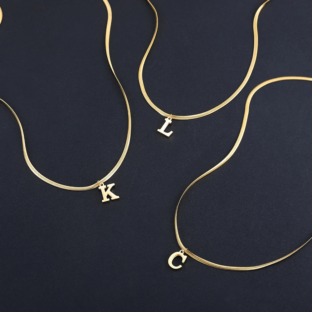 Pendentif  alphabet plaqué or inoxydable