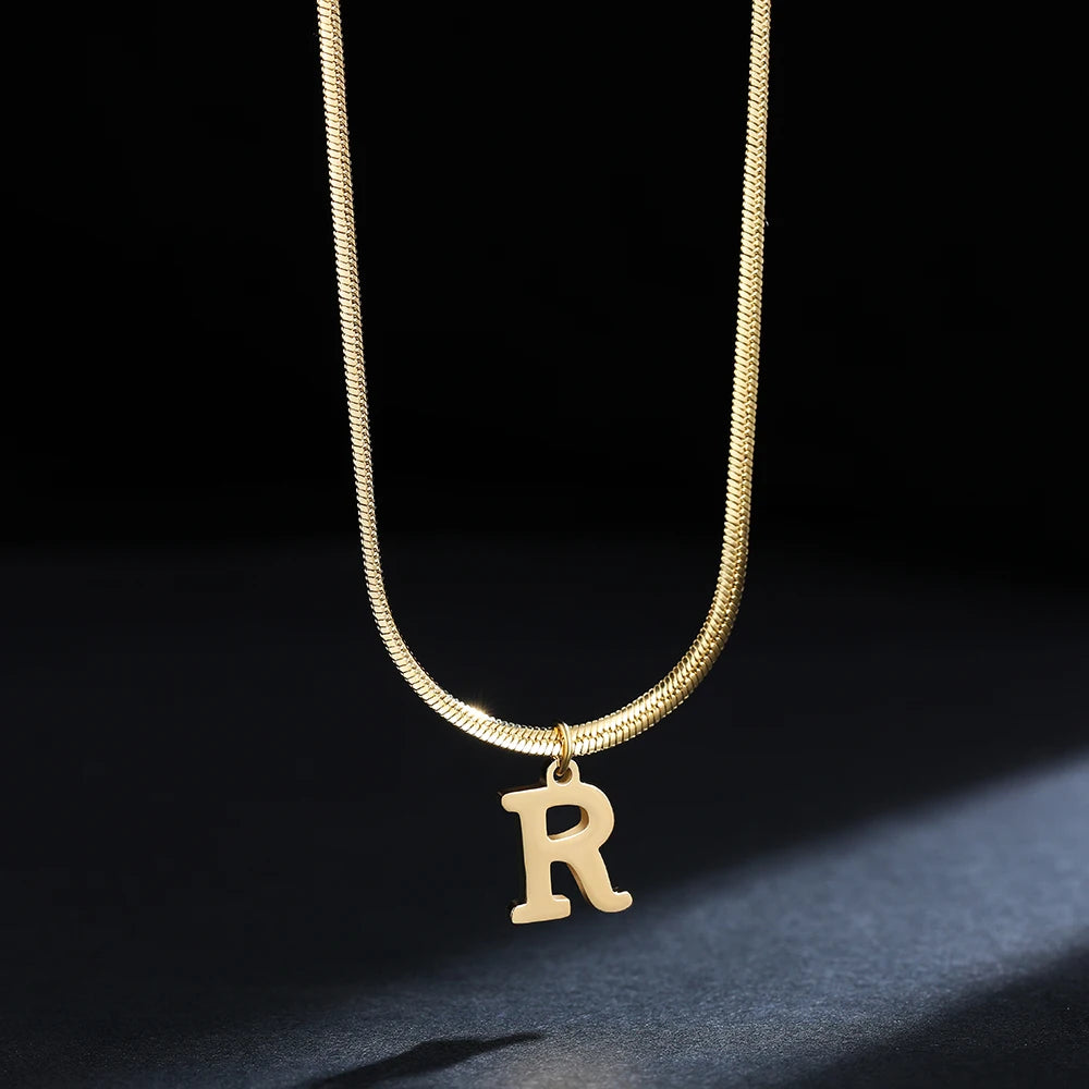 Pendentif  alphabet plaqué or inoxydable