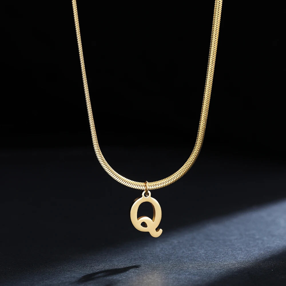Pendentif  alphabet plaqué or inoxydable