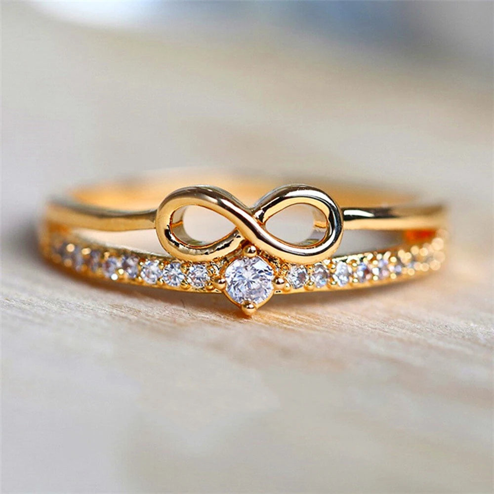 Huitan – bague Chic en forme d'arc pour femmes, signe infini, zircone cubique, accessoires de doigt à la mode, bijoux de fête quotidiens MAEJORKEN