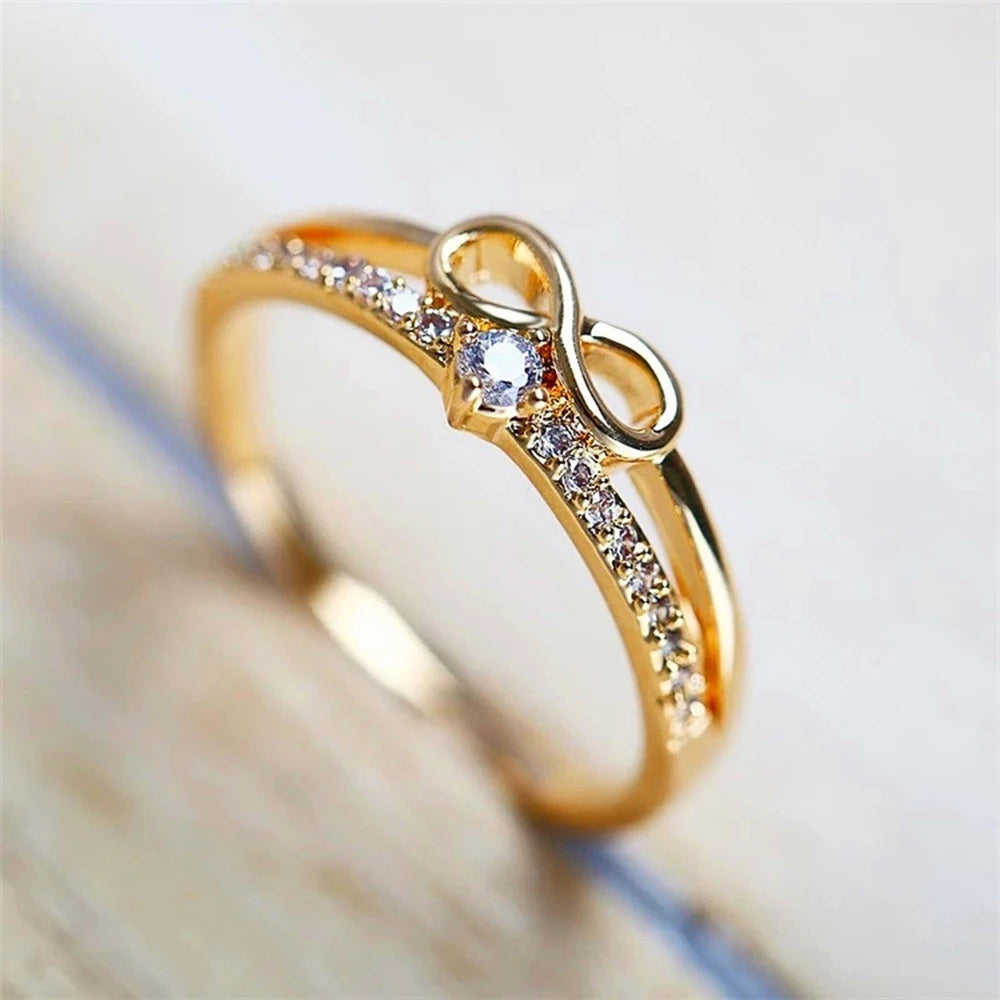 Huitan – bague Chic en forme d'arc pour femmes, signe infini, zircone cubique, accessoires de doigt à la mode, bijoux de fête quotidiens MAEJORKEN