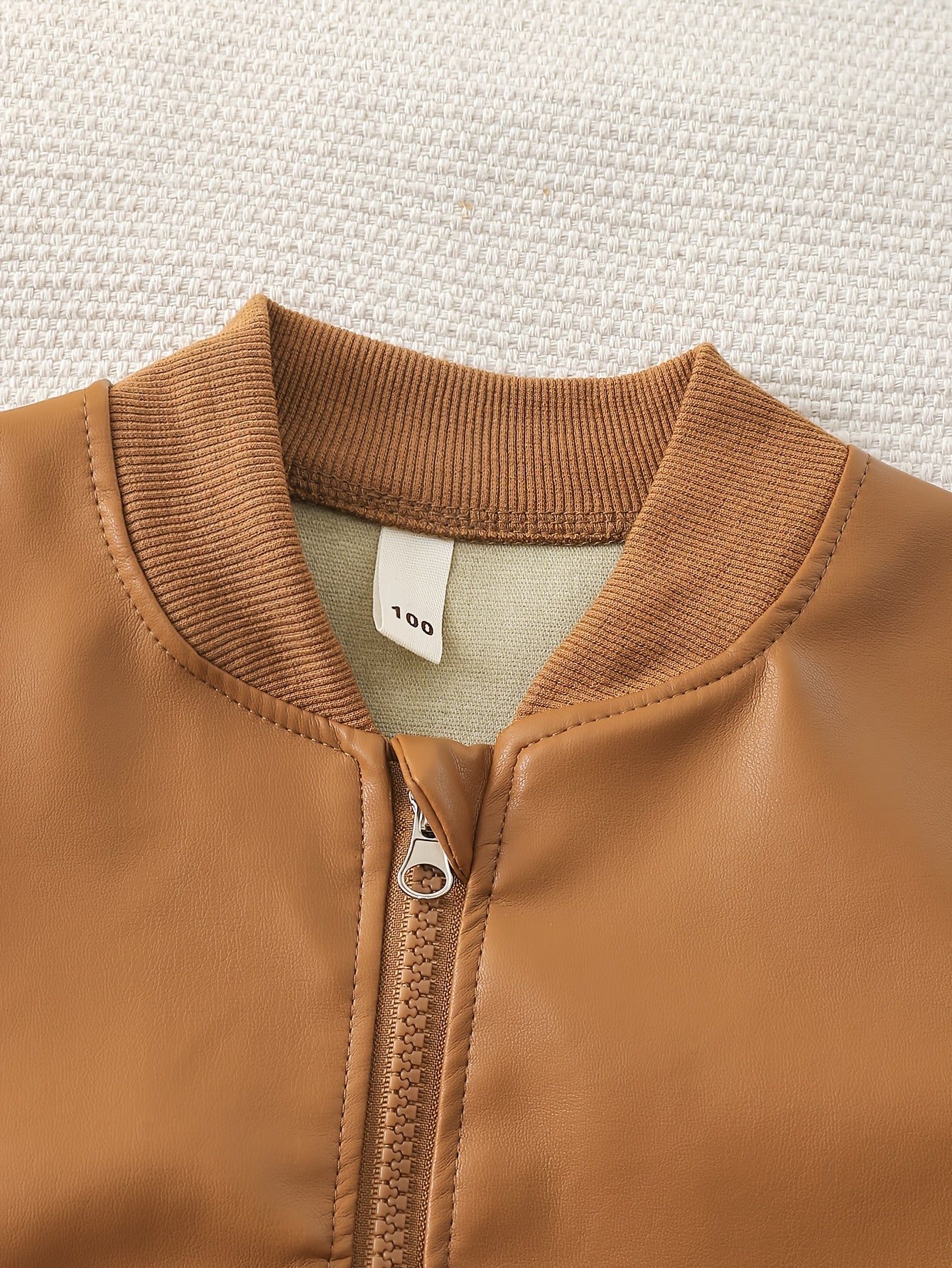 New Trendy Outfit for Boys: Brown Leather Jacket Paired with Black Cargo Pants. Simple Yet Stylish, The Leather Jacket Has a Quality Feel While The Cargo Pants Are Cool And Trendy. The Color Combination Is Harmonious And Fash MAEJORKEN